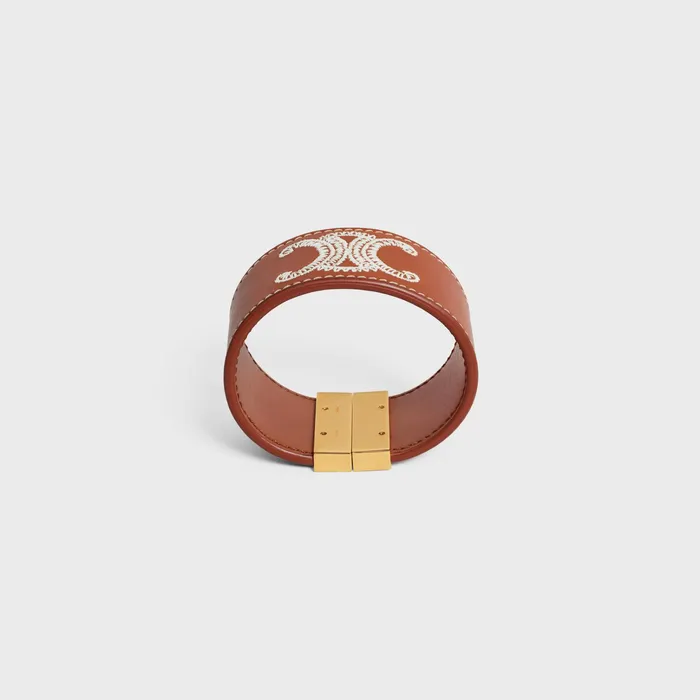 Celine Bracelets Triomphe Embroidered Leather Bracelet In Brass With Gold Finish And Calfskin 8211 Tan Ecru 8211 Women Celine Bracelets Triomphe Embroidered Leather Bracelet In Brass With Gold Finish And Calfskin 8211 Tan Ecru 8211 Women