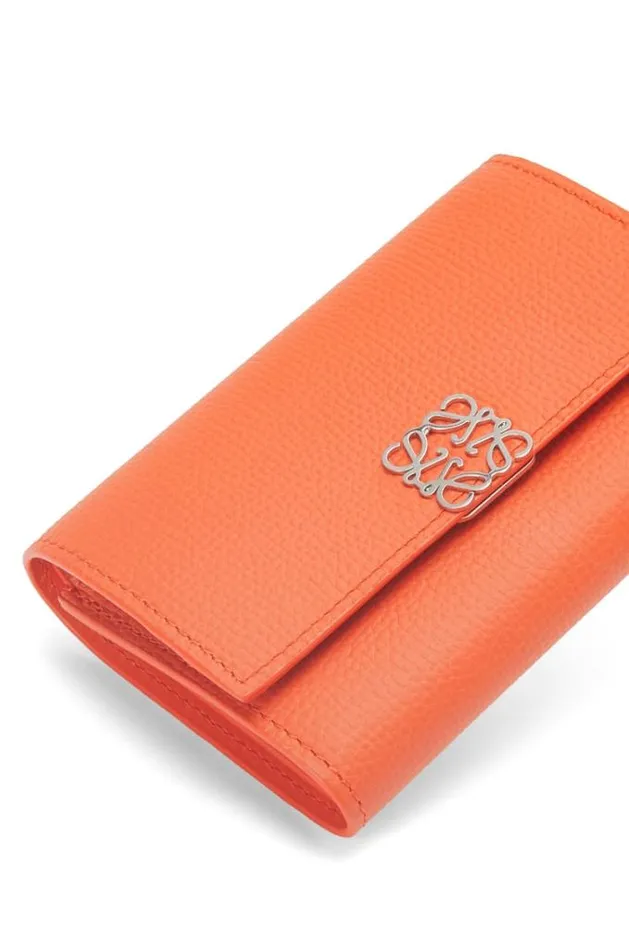 Loewe Anagram Small Vertical Wallet In Pebble Grain Calfskin Orange Women Small Wallets