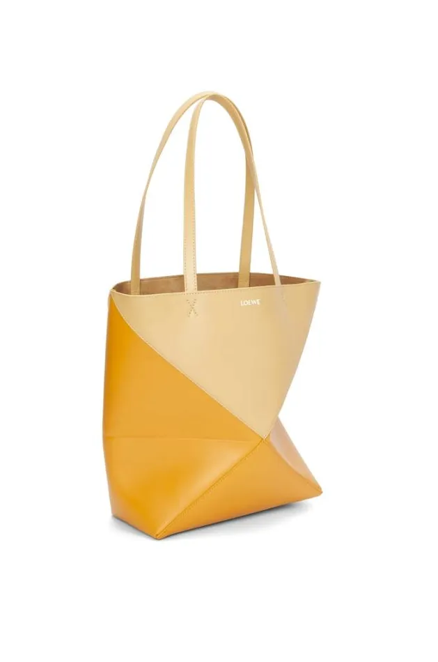 Loewe Puzzle Fold Tote In Shiny Calfskin Dark Buttersunflower Women Tote and Top Handle Bags